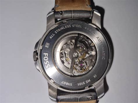 fossil watch serial number identification.